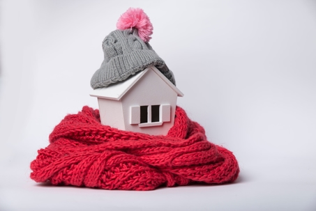 A house with a scarf and hat.